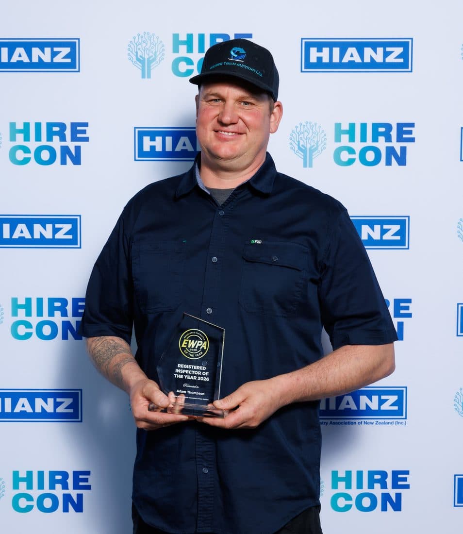 Adam Thompson holding the EWPA Registered Inspector of the Year 2026 trophy at HIRECON 26